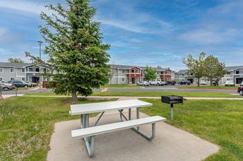 our apartments offer a picnic table and grill